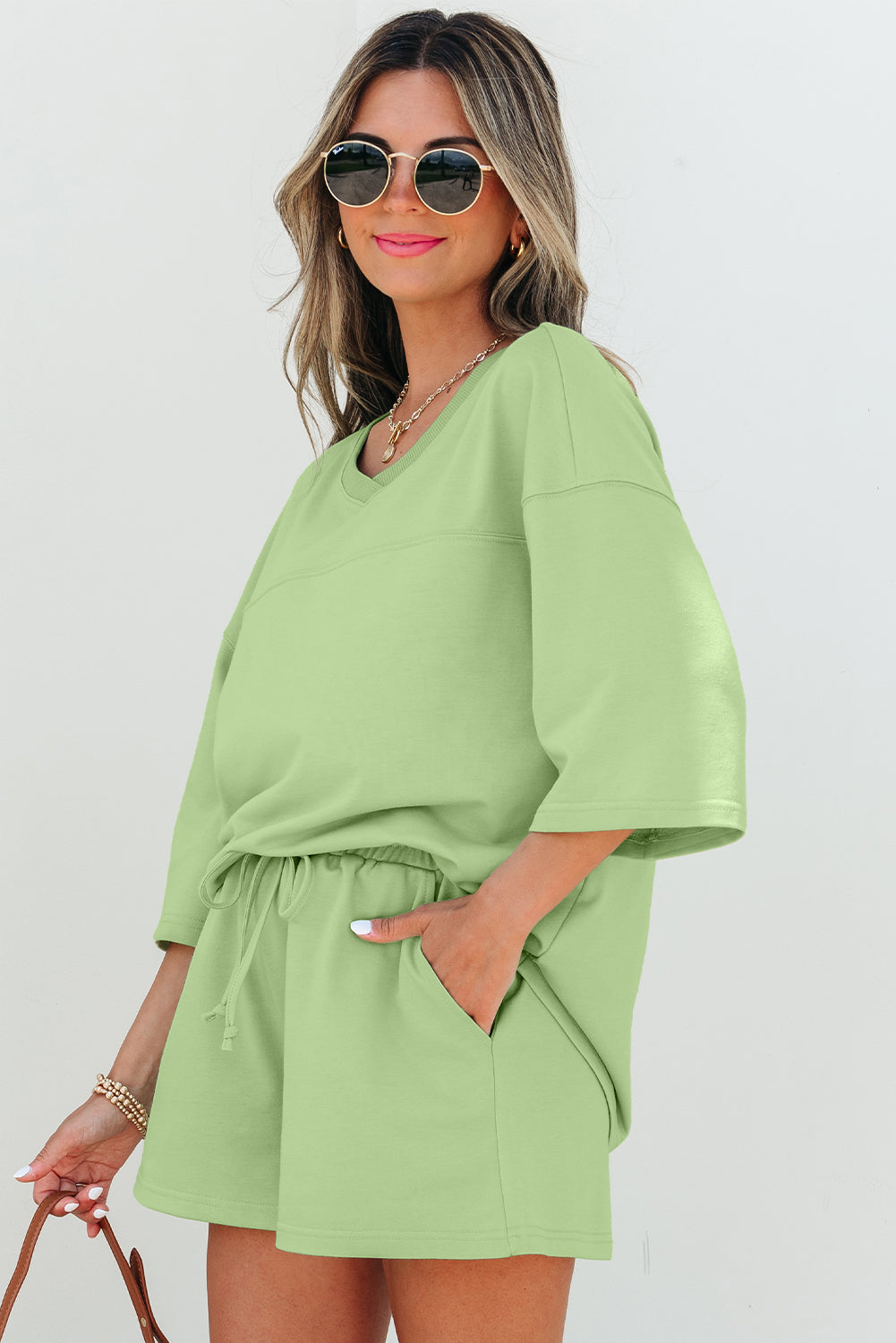 Women's Meadow Mist Green Solid V-Neck Half Sleeve Tee and Shorts Set
