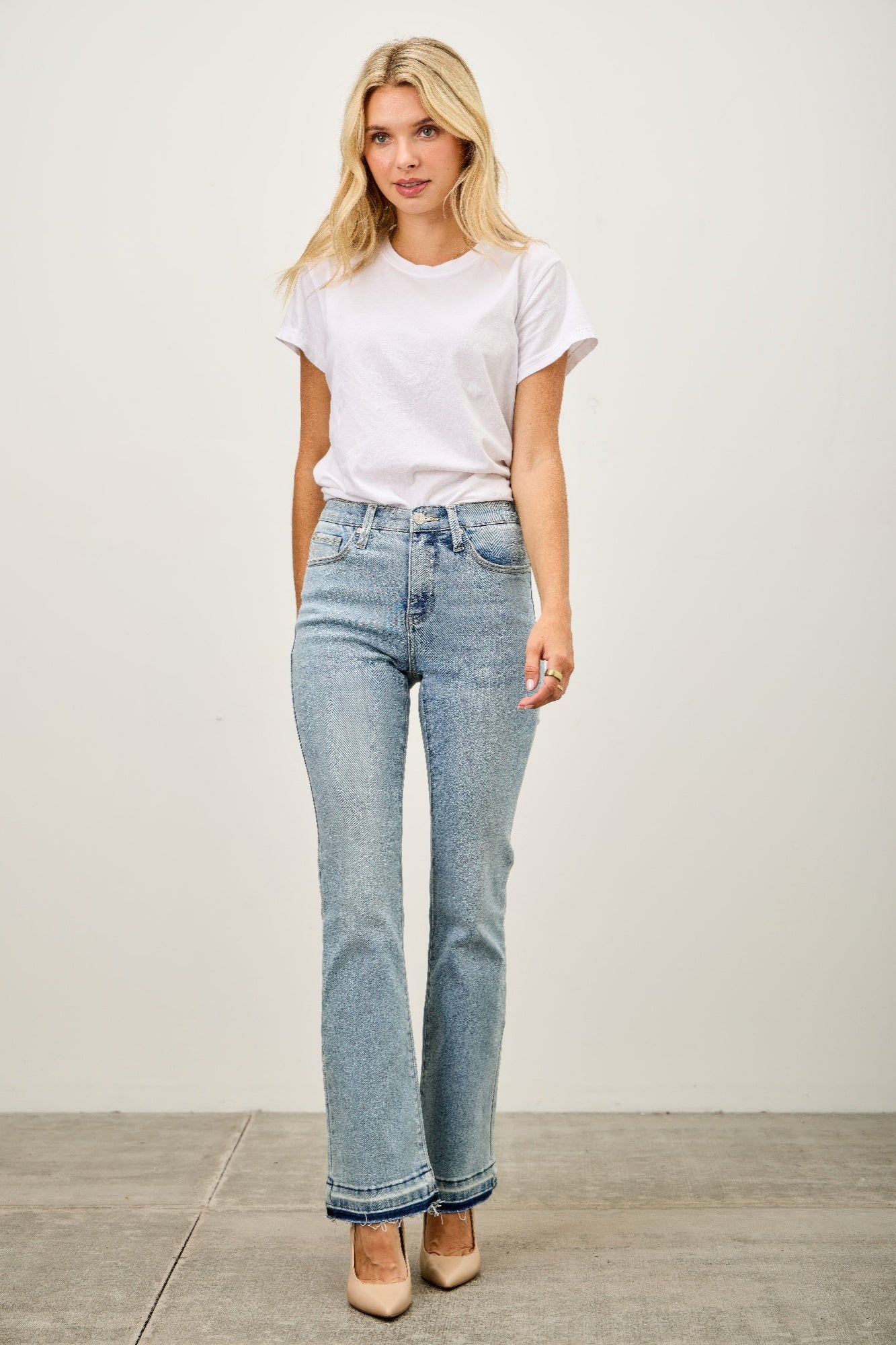 Mid Rise Flare With Released Hem