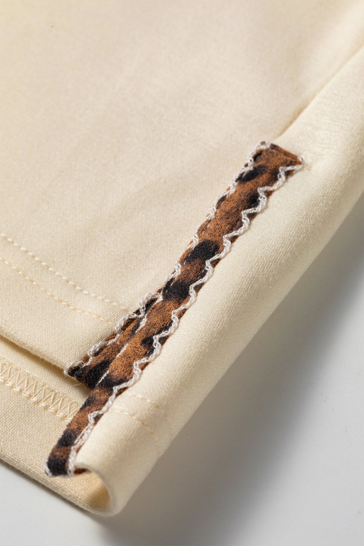 Beige Mock Neck Long Sleeve Leopard Split Hem Top